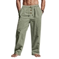 Detail of sage green cotton linen pants featuring drawstring waist and button fly decor - S / Army Green