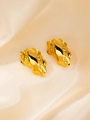 Detailed close-up of golden earrings with lava texture on beige satin fabric - Irregular Lava Texture Earrings