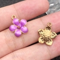 Purple enamel cherry blossom pendant with golden metal edges shown on fingers - 1Pc Purple Cherry Blossom 14x16mm