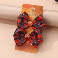 Detail of red and black checkered Halloween hair clips with orange pumpkin decor - Red Plaid Pumpkin Bow (Pair)