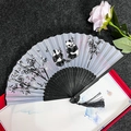 Traditional Chinese folding fan with black bamboo ribs and ink panda bamboo design - Panda Bamboo - Black Handle
