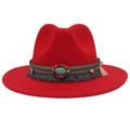 Detail of red wool felt cowboy hat featuring bohemian turquoise beads and tassel band - Red