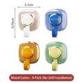Self-adhesive wall hooks in beige, blue, orange, and green with cute bear ears - 4-Pack / Multicolor