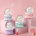 Luminous unicorn crystal ball music box in pink, blue, and purple dreamlike colors - Carousel Unicorn (No. 9) / Small With Light And Snow