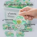 Single 5D camellia laundry detergent pod with multi-chamber design held by hand - Camellia 4g Bulk (150 Pods)