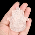 Hand-held rose quartz crystal Hamsa hand carving with natural translucent texture - White Crystal
