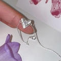 Silver heart bracelet with frosted pendant and clear zircon worn by a model - Frosted Heart Rhinestone (SL1399)