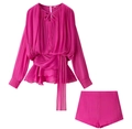 Detail of rose pink two-piece set featuring pleated drawstring top and matching shorts - Rose Red Set