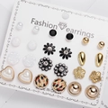 Set of 12 pairs of golden alloy stud earrings with pearls and floral motifs on card - Leopard Pearl Flower Heart Set (ER21Y0531-3)