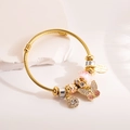 Elegant gold twisted rope bangle with pink enamel butterfly and crystal charms - Pink