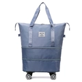 Blue expandable rolling travel bag with swivel wheels and reinforced nylon fabric - Foggy Blue