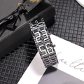 Detailed macro view of the silver stainless steel link strap with side adjustment buttons - Bright Silver White LED