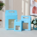 Three light blue kraft paper gift boxes with handles and clear windows in various sizes - 15*10*6cm / Light Blue