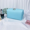 Light blue cross-textured PU leather makeup bag with gold double zippers and pearl letter - Medium / Light Blue