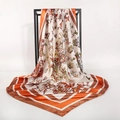 Detail of silk satin scarf showing orange borders and butterfly floral print on cream base - Cream Orange Border Flower Butterfly (1)