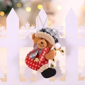 Christmas bear plush ornament with red sweater and plaid hat hanging on white fence - Bear With Candy Cane