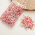 Detail view of colorful elastic hair bands in a transparent bag and wooden tray - Deep Pink Series (1000Pcs)