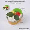 Realistic fruit cupcake candle with kiwi and raspberry in gold foil cup display - Kiwi - Yellow Foil Cup Cake