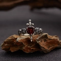 Macro detail of gothic S925 silver ring with red heart garnet and sword motifs - Natural Garnet Rose Ring LR363