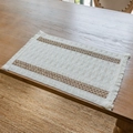 Beige cotton linen placemat with dark brown woven stripes and fringe on wooden table - Dark Brown Striped