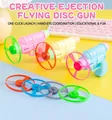 Pink yellow and blue slingshot frisbee gun set with four colorful propellers for kids - Disc Launcher Gun