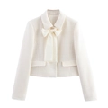 Ensemble chic en tweed blanc cassé avec une veste courte ornée d'un grand nœud élégant - XS / Hauts / Blanc