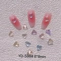 Macro detail of transparent 3D heart nail charms in mixed colors for manicure art - YD-598# (8x8mm)