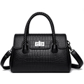 Classic black embossed leather handbag with woven handle and silver twist-lock closure - Black