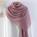 Wrinkled cotton linen scarf in pastel purple with fringe edges on a hanger - Pink Purple