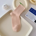 Ribbed knit mid-calf cotton socks in soft apricot color displayed on a tray - One Size / Honeydew