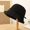 Dicker schwarzer Wollfischerhut für Damen mit Kunstpelzkrempe und dekorativer Schleife - M (56-58cm) / Schwarz
