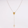 Detail of a long gold crystal rosary necklace with transparent beads and a cross pendant - Clear
