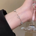 Elegant silver bracelet with aurora crystals and stones on a model's wrist - Silver Cat's Eye Circle (MY32292)