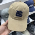 Detailed close-up of khaki cotton twill baseball cap with Keep Your Smile embroidery - M / Khaki