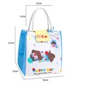 Insulated blue lunch bag with cute dog cartoon print and sturdy white rope handles - Blue