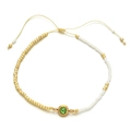 Detail of adjustable beaded bracelet with green crystal and gold-tone accents - Green