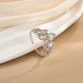 Detail of silver crown ring featuring teardrop crystals and purple gemstones - JZ0102G-Silver Clear Teardrop Crown