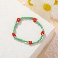 Bohemian seed bead choker with green beads and red flower patterns for a vibrant look - Green Red Flower Bracelet