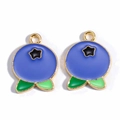 Detail of blue blueberry alloy charms with gold edging and green leaves for DIY jewelry - Blueberry