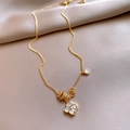 Macro shot of gold clover pendant with clear zircons on champagne satin background - Gold Diamond Inset Clover Style (5#)