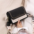 Chic black and white crossbody bag with vintage wide strap and gold V-shaped stitching - Black