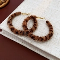 Macro detail of brown leopard print plush hoop earrings with golden metal clasp - 6# Round Leopard Print Flocked Hoop Earrings with Silver Earring Post
