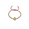 Bracciale etnico boho con cordino intrecciato rosso, perle dorate e ciondolo religioso - Corda Rossa con Perle Dorate