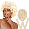Champagne gold satin sleep cap featuring a wide elastic band and large decorative bow - One Size / Beige