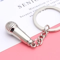 Creative silver microphone keychain with polished metal finish and textured mesh detail - Microphone Style / Silver