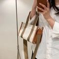 Minimalist canvas tote bag with brown leather trim and wide adjustable shoulder strap - Small / Brown