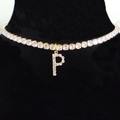 Gold choker necklace with sparkling zircon pave and letter P pendant on black display - Letter P [Gold]