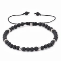 Détail du bracelet en perles de lave réglable avec des séparateurs argentés ornés - Pierre de Lave Noire (05)