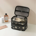 Double-layer black mesh makeup bag with white daisy pattern and secure zipper closure - Double Layer Daisy