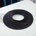 Detail view showing textured black straw weave and layered pleats on sun visor hat - One Size / Black